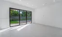 First Floor Master Suite. Opens to Pool Area.