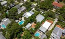 Aerial views of this exquisite villa with private guest house, pool and outdoor amenities to enjoy with family & friends.