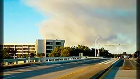 Brush Fire Darkens Beach Skies!