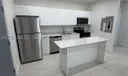 879 E 24th St #203 Photo