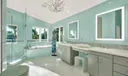 The Master Bathroom Exudes Elegance with its Mint Color Palette and Ample, Spacious Design!