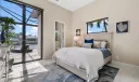 Junior suite with walk -in closet, full bathroom and patio door to the patio.