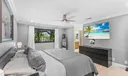 Primary bedroom has great natural light and a soothing view of the treetops