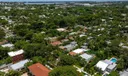 Aerial views of this exquisite villa with private guest house, pool and outdoor amenities to enjoy with family & friends.