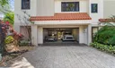 Two car garage with parking for two more cars