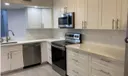 9055 Wiles Rd #307 Photo