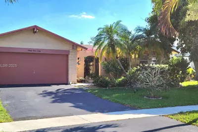 FRONT OF HOUSE W/ 2 CAR GARAGE