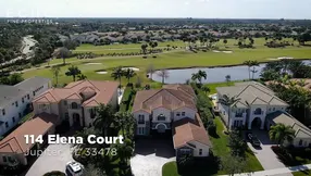 Coveted, Customized Jupiter Country Club Home on Prime Lot with Over 1/3 Acre with Captivating Lake, Golf Course & Nature Views!