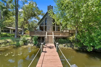 Front of home with walk way to Gazebo.