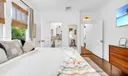 Primary king bedroom with newly updated designer en-suite bathroom.