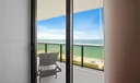 Sliders to balcony from primary bedroom