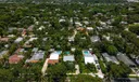 Aerial views of this exquisite villa with private guest house, pool and outdoor amenities to enjoy with family & friends.