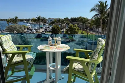 Relax on the balcony overlooking the marina