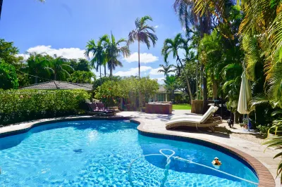 Sparkling pool nestled in spacious backyard uncomm