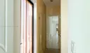 Cabana entry from the pool and backyard - shower in the back