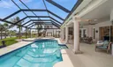 Large covered lanai steps from the pool