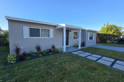 Front of Home with New Walkway, Sod, Landscaping &