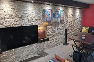Marble accent wall tastefully done in open living