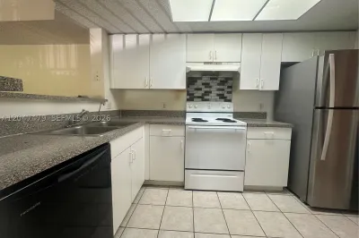 5011 Wiles Rd #207 1