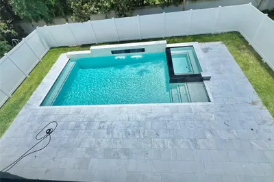 $150,000 heated pool
