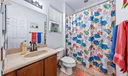 Bathroom with tub/shower combo.