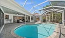 Sparkling Pool with Screen Porch