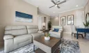 Second floor in-law suite living room accessible by elevator or stairs.