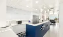 Fully remodeled kitchen with Quartz countertops & backsplash, custom cabinetry, built in down draft, heat reduction appliances (Induction, convection & air cooking.)