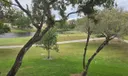 Rear Patio Overlooking The Golf Course And Water