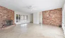 living room with working fireplace