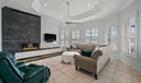 A long wall of windows in the family room for lots of light and fantastic canal views!