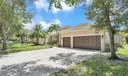 Long paver driveway fits up to 6 cars!