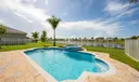fenced in Patio | Pool with view to the lake
