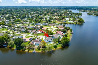 over head view of home and lake