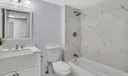 Guest Bathroom with shower/tub comb