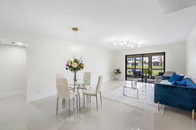 7370 S Oriole Boulevard #106 1