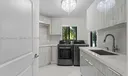 6180 Pine Tree Dr Photo