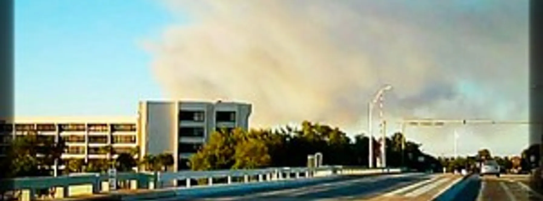 Brush Fire Darkens Beach Skies!