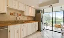 5250 Woodland Lakes Drive #128 Photo