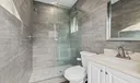 Guest bath 3 is a cabana bath accessed from the outdoor pool deck.