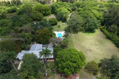  AERIAL VIEW FIVE ACRE COMPOUND OF TWO HOMES, POOL