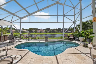 SCREENED-IN, HEATED, SALT WATER POOL