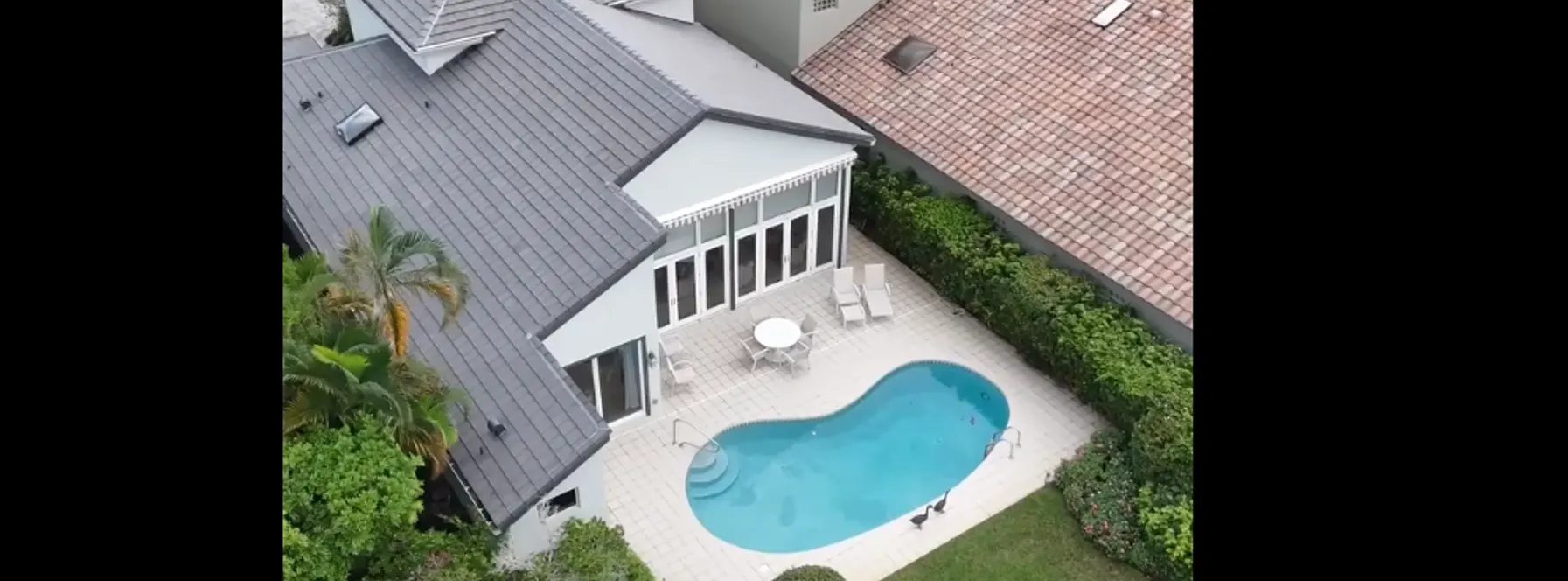 Frenchman’s Creek Estate with Lake & Pool Views