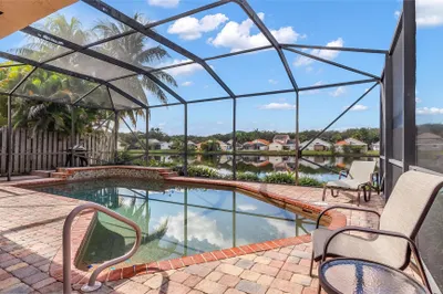 Stunning Lake Views and Screen Enclosed Pool & Pat