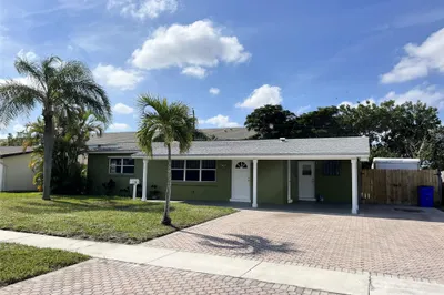 303 SE 3rd Ter 1