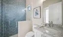 Full bathroom with access to the pool.