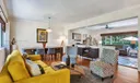 as you walk in the open floor plan greets you.