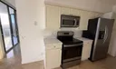 Kitchen opening to living room