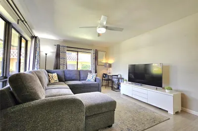 VIEW OF THE LIVING ROOM FROM THE FRONT DOOR