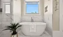 Standalone Soaking Tub in the Master